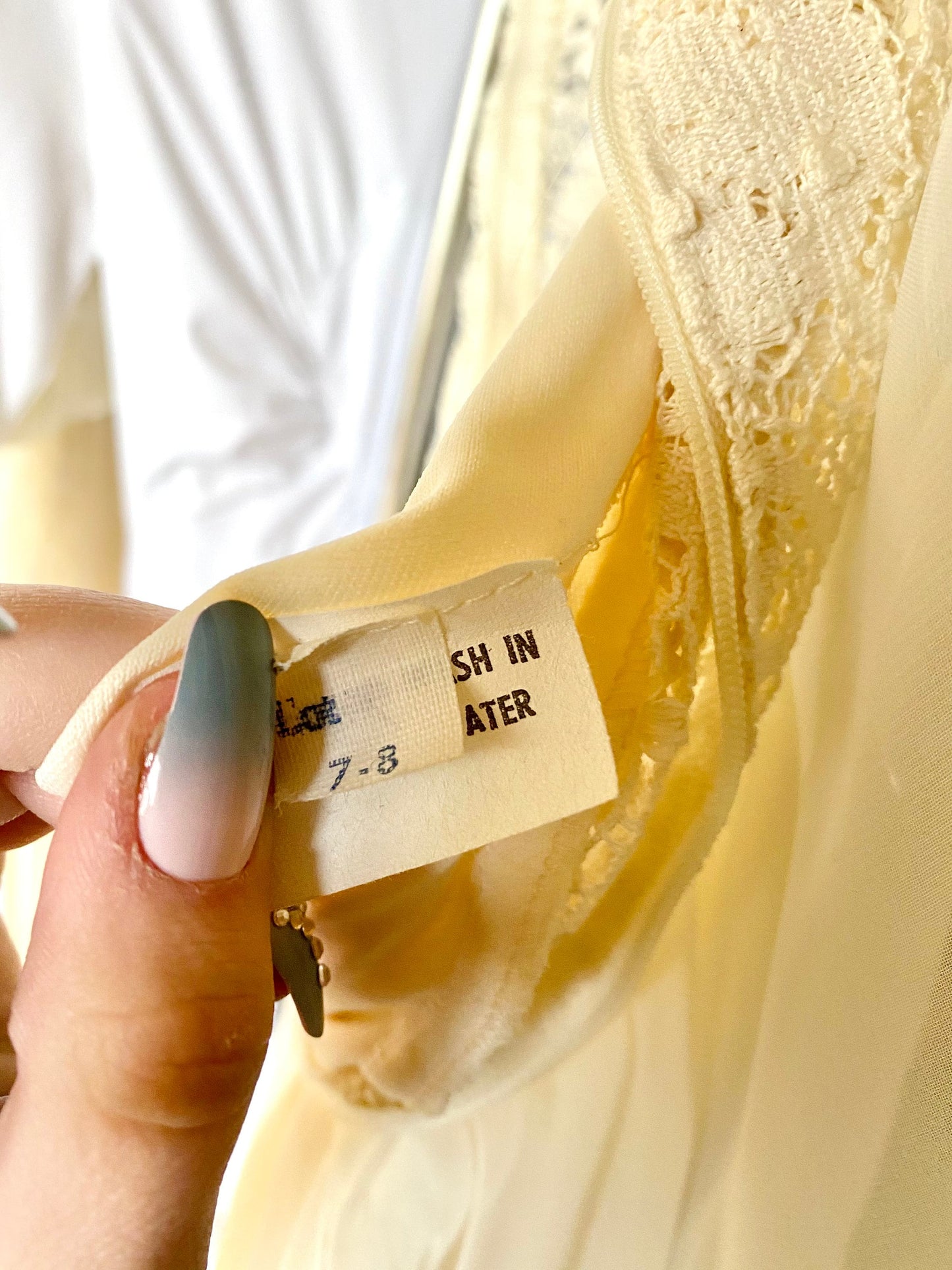 Sleeveless Butter Cream Dress with Sheer Yoke and High Modest Collar