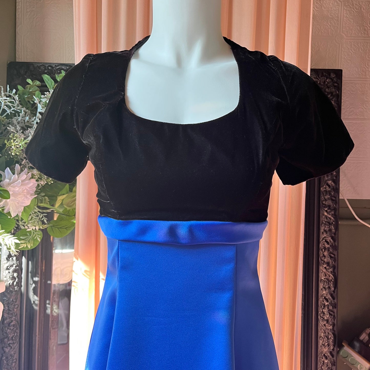 Vintage dress with a black velvet short sleeve top and long dark blue skirt