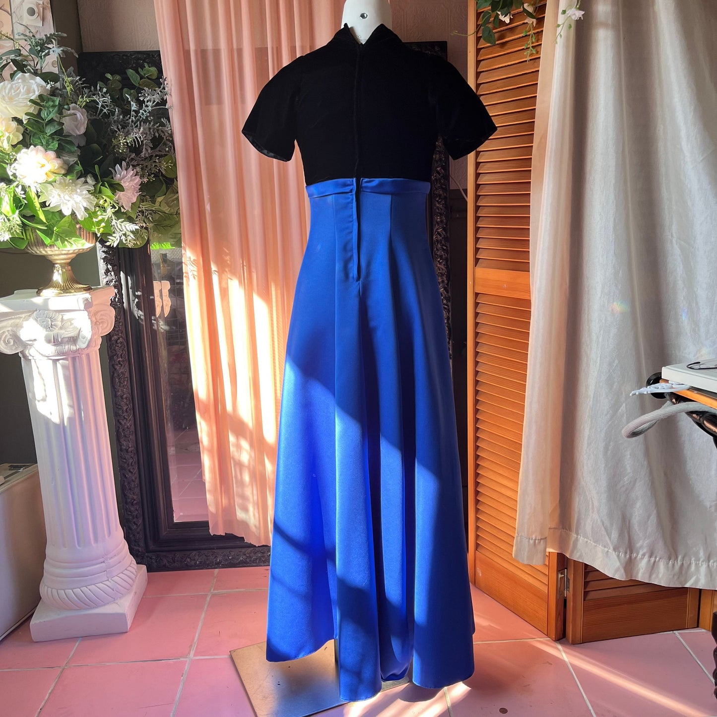 Vintage dress with a black velvet short sleeve top and long dark blue skirt
