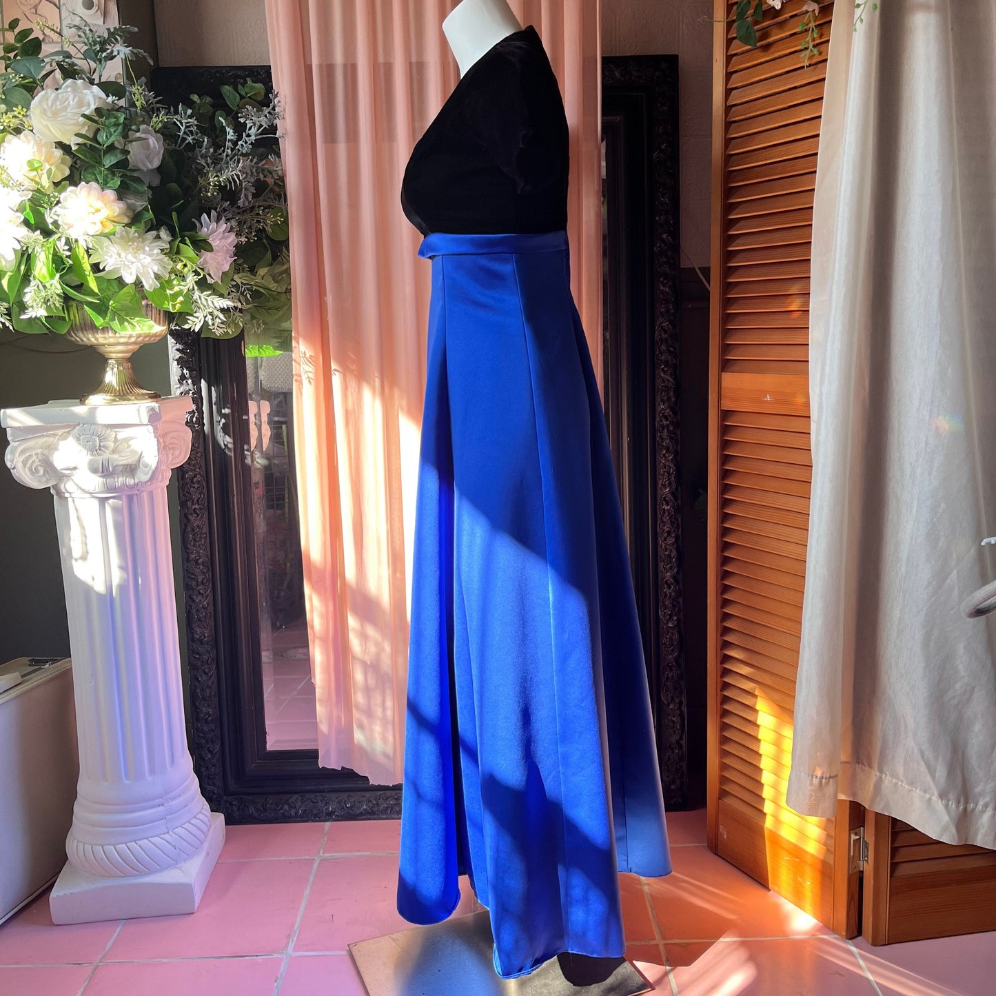 Vintage dress with a black velvet short sleeve top and long dark blue skirt