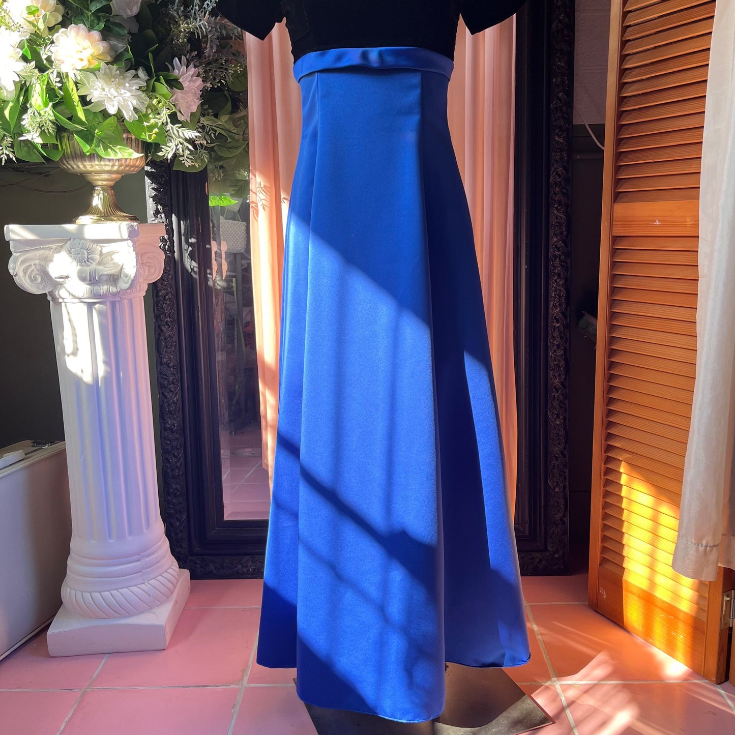 Vintage dress with a black velvet short sleeve top and long dark blue skirt