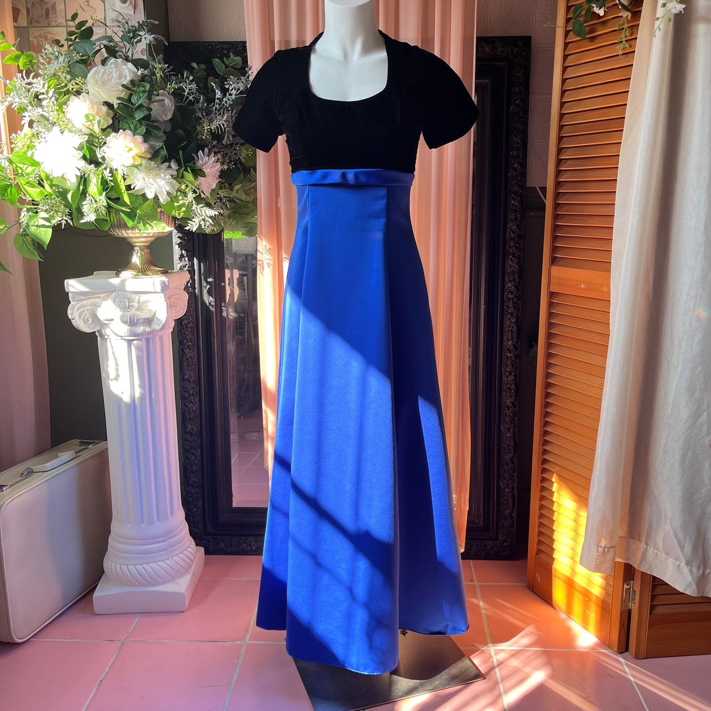 Vintage dress with a black velvet short sleeve top and long dark blue skirt