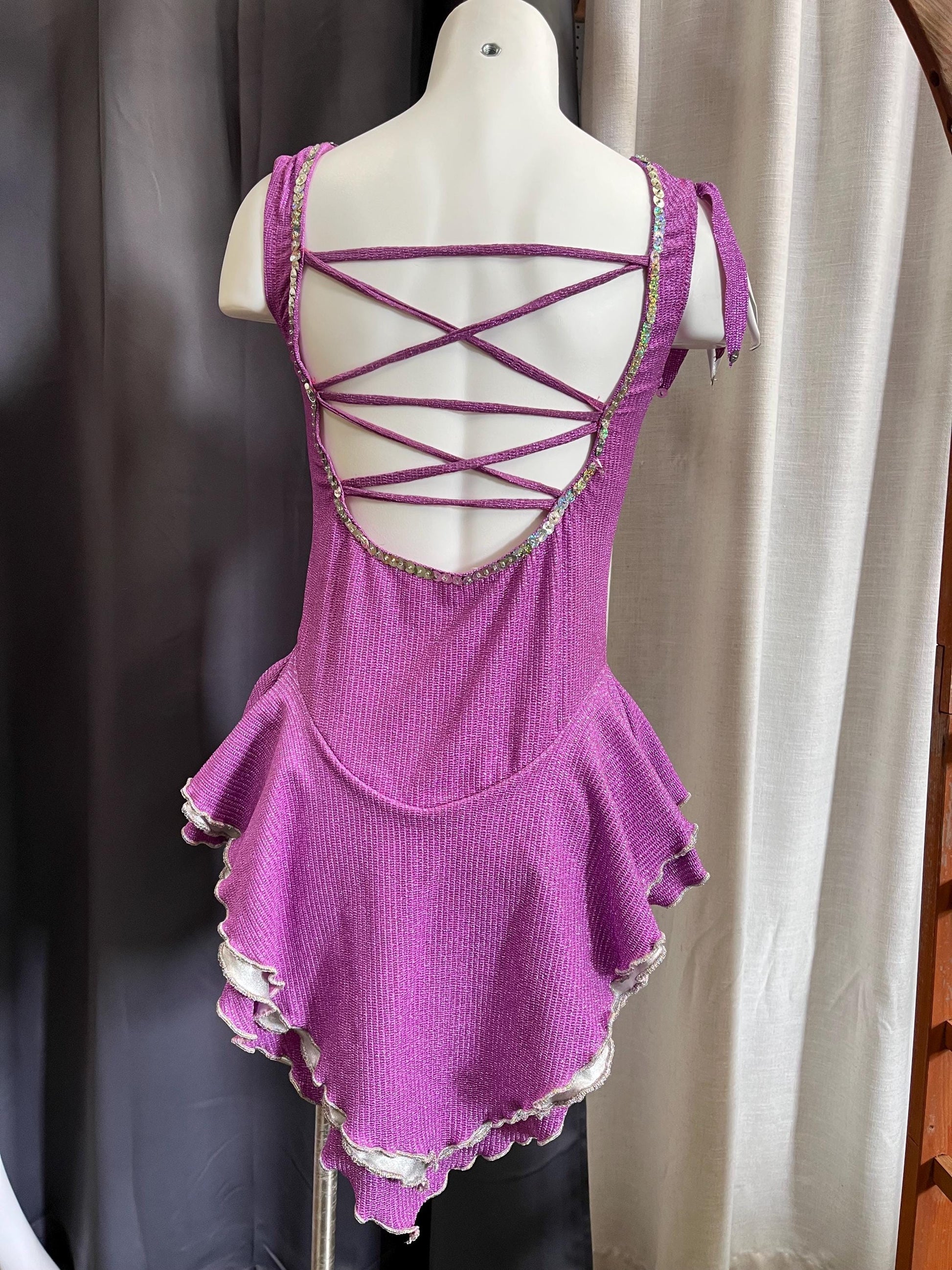 Fairy Ring Sparkle Bodysuit – Purple Checkered Hologlam Leotard with Criss-Cross Back & Ruffled Hem