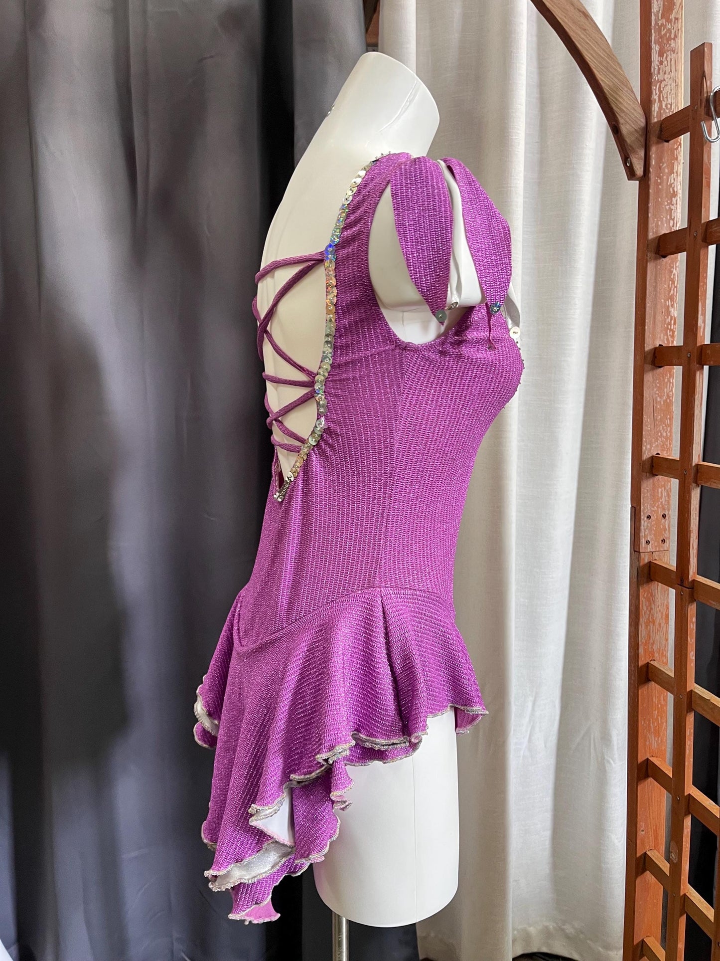 Fairy Ring Sparkle Bodysuit – Purple Checkered Hologlam Leotard with Criss-Cross Back & Ruffled Hem