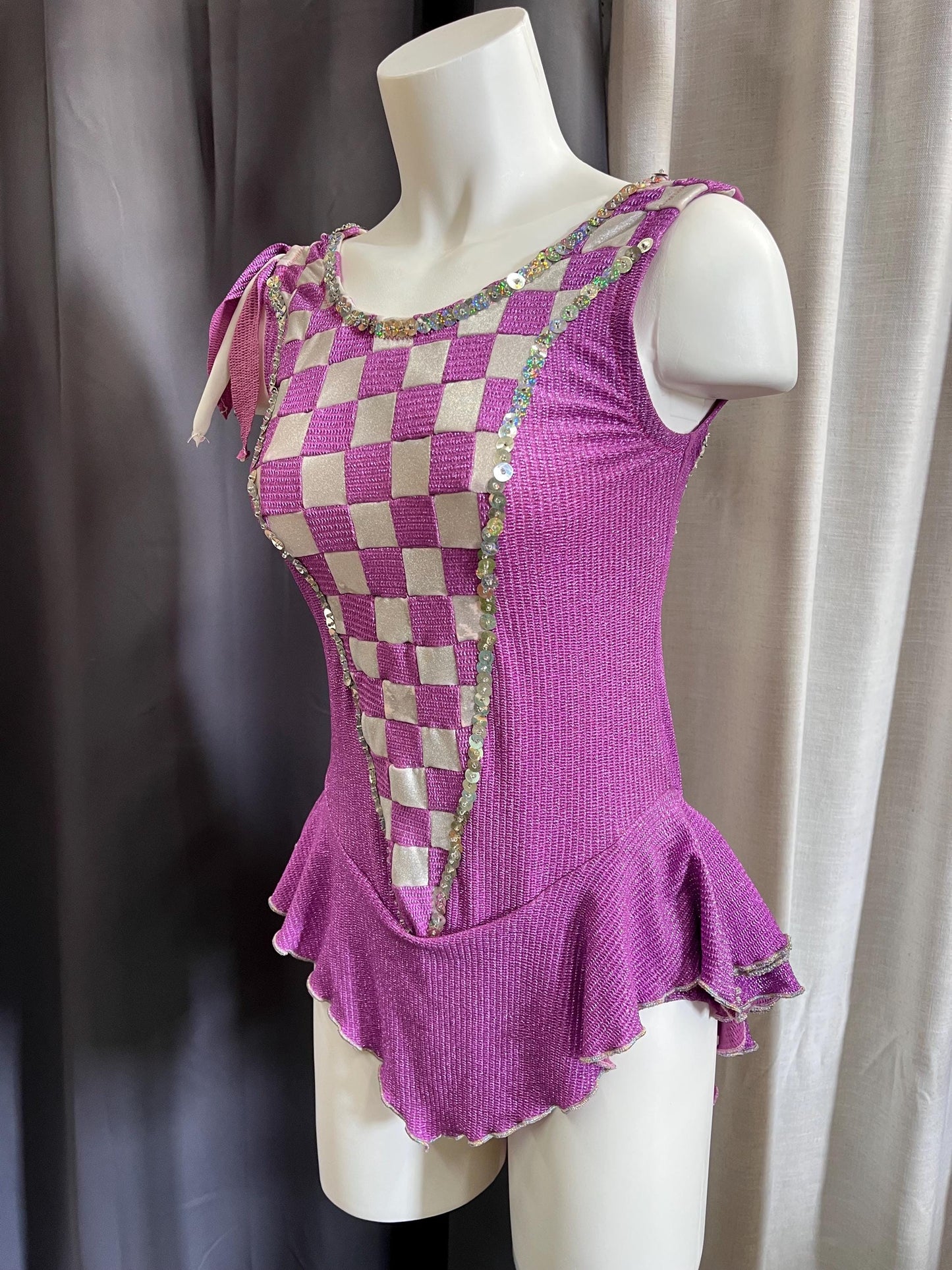Fairy Ring Sparkle Bodysuit – Purple Checkered Hologlam Leotard with Criss-Cross Back & Ruffled Hem