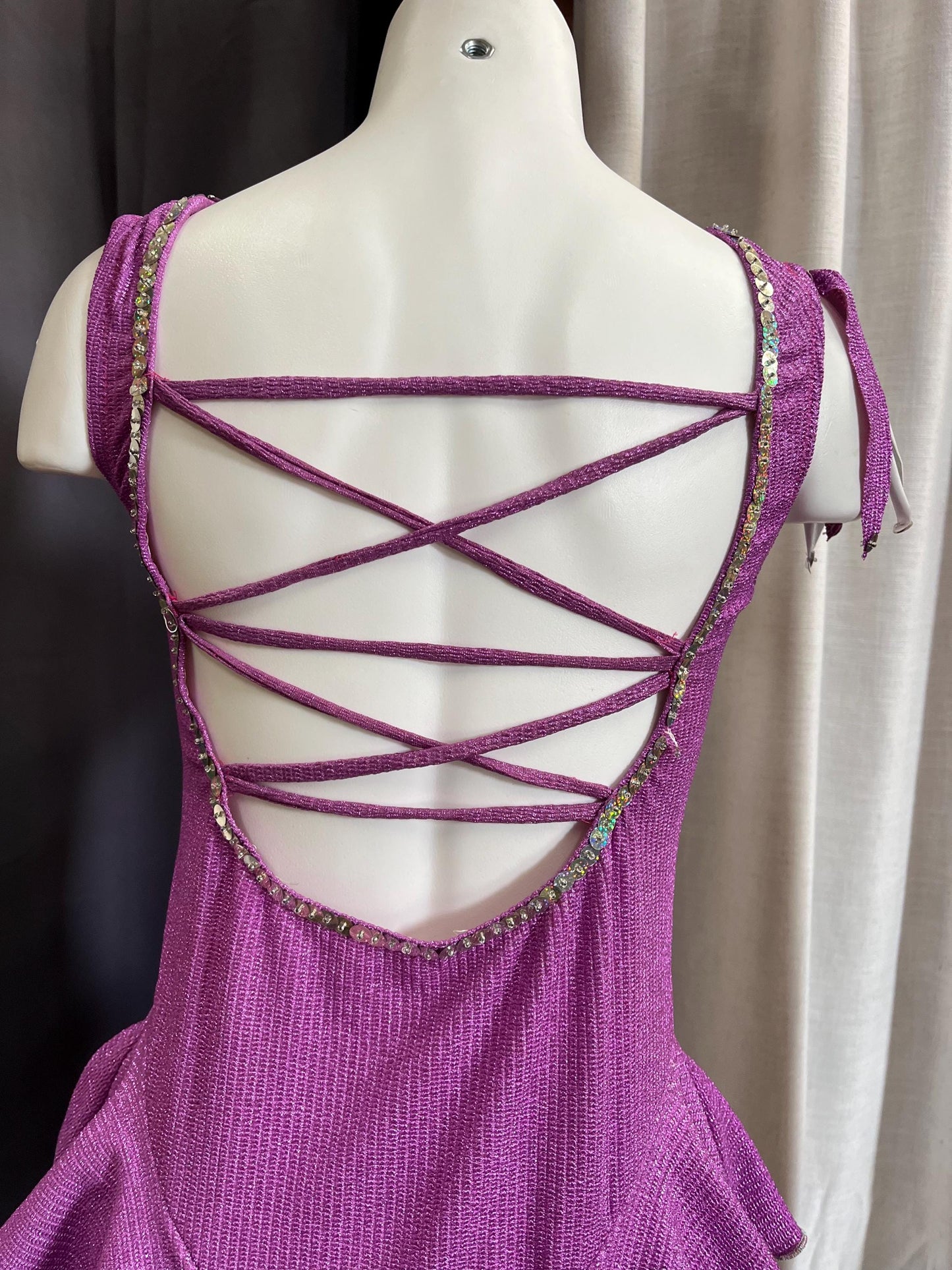 Fairy Ring Sparkle Bodysuit – Purple Checkered Hologlam Leotard with Criss-Cross Back & Ruffled Hem